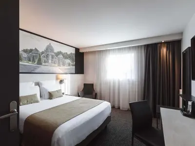 Un ou plusieurs lits dans un hébergement de l'établissement Hôtel Mercure Lyon Centre Charpennes Parc de la Tête d'Or