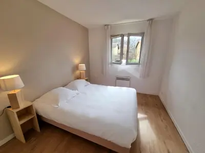 Un ou plusieurs lits dans un hébergement de l'établissement Garden & City Lyon - Lissieu