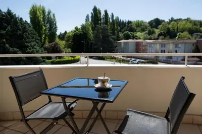 Balcon ou terrasse dans l'établissement Hotel Médicis