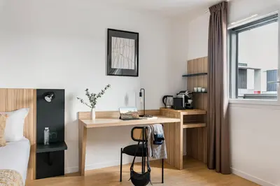 Cuisine ou kitchenette dans l'établissement Appart hôtel Q7 Lodge Lyon 7