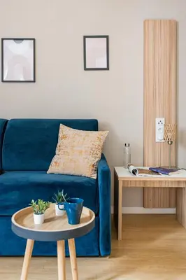 Coin salon dans l'établissement Appart hôtel Q7 Lodge Lyon 7