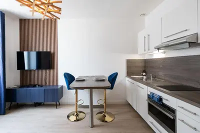 Cuisine ou kitchenette dans l'établissement Le Hirvi - cocon zen et épuré à 10min Vieux Lyon