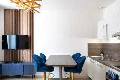 Cuisine ou kitchenette dans l'établissement Le Hirvi - cocon zen et épuré à 10min Vieux Lyon