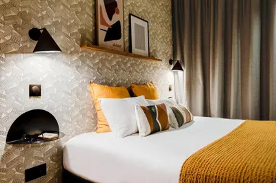 Un ou plusieurs lits dans un hébergement de l'établissement Republik Hotel