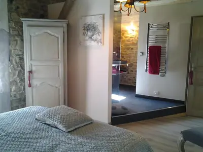 Un ou plusieurs lits dans un hébergement de l'établissement Le Clos du Merle