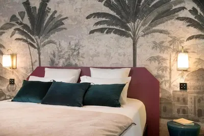 Un ou plusieurs lits dans un hébergement de l'établissement MiHotel Tour Rose