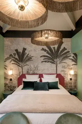 Un ou plusieurs lits dans un hébergement de l'établissement MiHotel Tour Rose