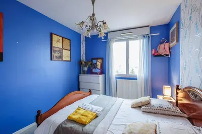 Un ou plusieurs lits dans un hébergement de l'établissement COSY ROOM CROIX ROUSSE