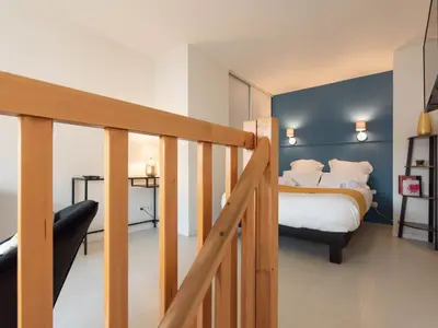Un ou plusieurs lits dans un hébergement de l'établissement Duplex coquet avec PARKING proche centre-ville de Lyon