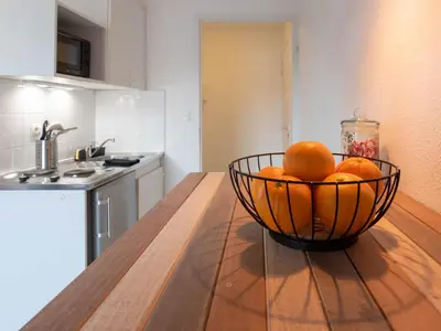 Cuisine ou kitchenette dans l'établissement Duplex coquet avec PARKING proche centre-ville de Lyon