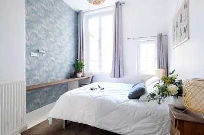 Un ou plusieurs lits dans un hébergement de l'établissement trendy flat-lyon centre-hotel de ville