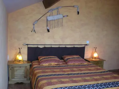 Un ou plusieurs lits dans un hébergement de l'établissement LES CHAMBRES DE L'OUEST