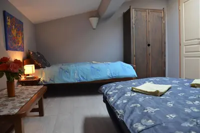 Un ou plusieurs lits dans un hébergement de l'établissement Studio et colocation - Gîte Les 7 fontaines