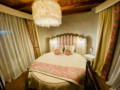 Un ou plusieurs lits dans un hébergement de l'établissement Domaine de Suzel Hôtel & Spa