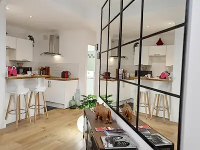 Cuisine ou kitchenette dans l'établissement Le Tisserand by Cocoonr