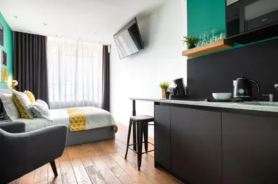 Cuisine ou kitchenette dans l'établissement MOHOM - Berges du Rhône