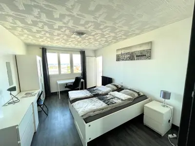 Plan de l'établissement Grande chambre avec balcon privée dans un appartement en collocation