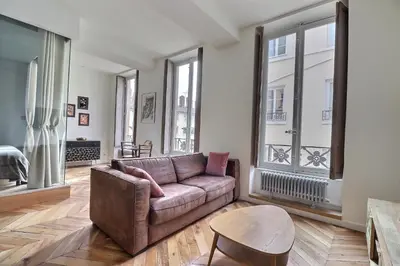 Coin salon dans l'établissement Loft au cœur de Lyon Tout à pied