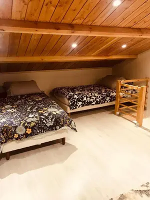 Un ou plusieurs lits dans un hébergement de l'établissement La bohème, gîte de charme