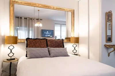 Un ou plusieurs lits dans un hébergement de l'établissement MHL - Maison Hotel Lyon