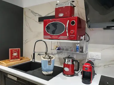 Cuisine ou kitchenette dans l'établissement Stop Chez M Select Street # Qualité # Confort # Simplicité
