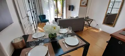 Coin salon dans l'établissement La Parenthèse, Rez de jardin indépendant, 4 étoiles