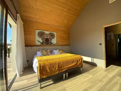 Un ou plusieurs lits dans un hébergement de l'établissement World Hotel