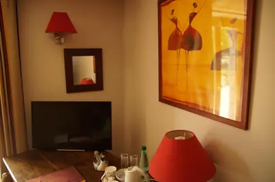Télévision ou salle de divertissement dans l'établissement Le Grand Noë