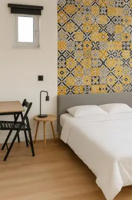 Un ou plusieurs lits dans un hébergement de l'établissement Chambres cosy proche cnpe Bugey - via rhona