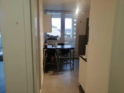 Télévision ou salle de divertissement dans l'établissement L'appart de la tour T4