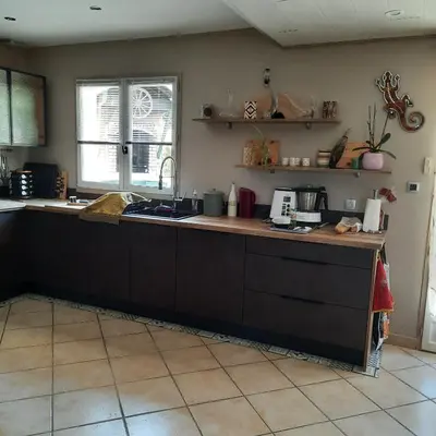 Cuisine ou kitchenette dans l'établissement chambre AU DOUX REFUGE
