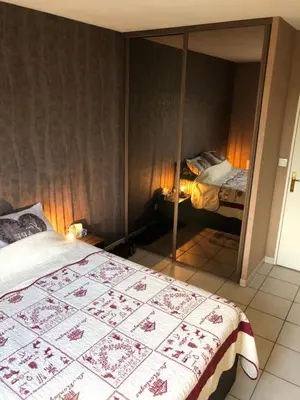 Un ou plusieurs lits dans un hébergement de l'établissement Confort d’Ange