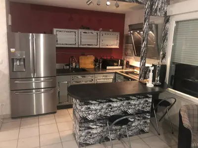 Cuisine ou kitchenette dans l'établissement Confort d’Ange