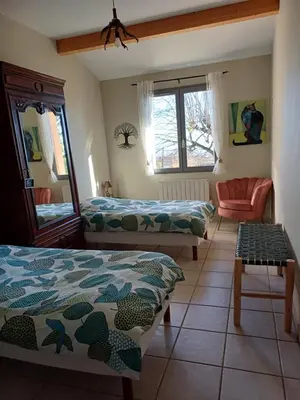 Un ou plusieurs lits dans un hébergement de l'établissement Gîte le Chêne du Py