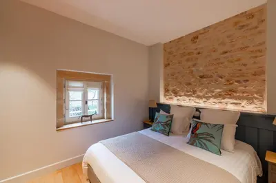 Un ou plusieurs lits dans un hébergement de l'établissement Château de Champ-Renard