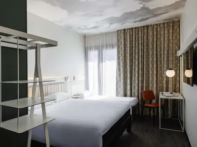 Un ou plusieurs lits dans un hébergement de l'établissement ibis Lyon Est Meyzieu