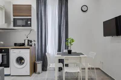 Cuisine ou kitchenette dans l'établissement GuestReady - 1chambre, 5min Gare Part Dieu