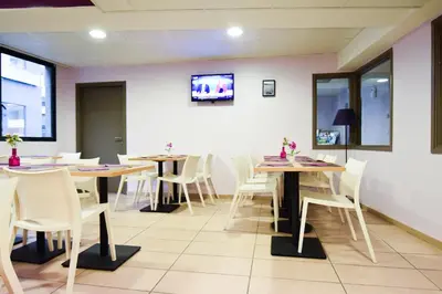 Télévision ou salle de divertissement dans l'établissement Residhotel Lyon Lamartine