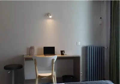 Télévision ou salle de divertissement dans l'établissement Europa Hotel