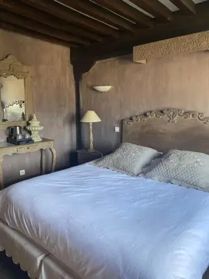 Un ou plusieurs lits dans un hébergement de l'établissement Hôtel de la Tour