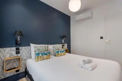 Un ou plusieurs lits dans un hébergement de l'établissement Superb apartment in the heart of the peninsula - Air-conditioned