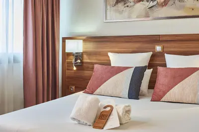 Un ou plusieurs lits dans un hébergement de l'établissement Hotel Gatsby by HappyCulture