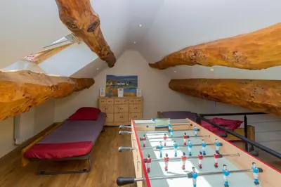 Salle de jeux dans l'établissement Gîtes d'Amelyann