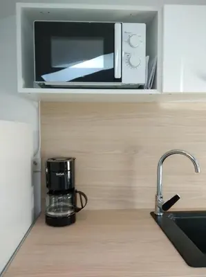 Cuisine ou kitchenette dans l'établissement T3 - 3 à 4 personnes tout équipé