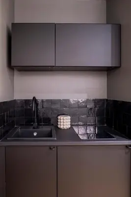 Cuisine ou kitchenette dans l'établissement Suite Georgia - appartement 2 personnes - Check in h24 & Wifi