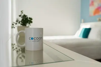 Un ou plusieurs lits dans un hébergement de l'établissement Cocoon Appart 2 Miribel