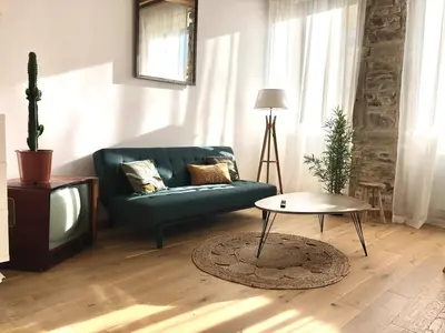 Coin salon dans l'établissement Le Canut de St Just