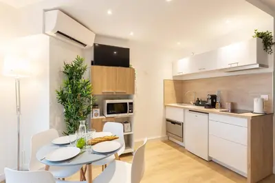 Cuisine ou kitchenette dans l'établissement GuestReady - Studio Gerland neuf avec terrasse