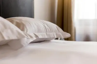 Un ou plusieurs lits dans un hébergement de l'établissement All in Lyon | Studio authentique Vieux Lyon