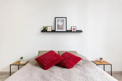 Un ou plusieurs lits dans un hébergement de l'établissement Le Steel-Appart Cosy-Parking-WIFI-NETFLIX